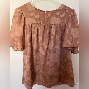 Brown babydoll blouse.